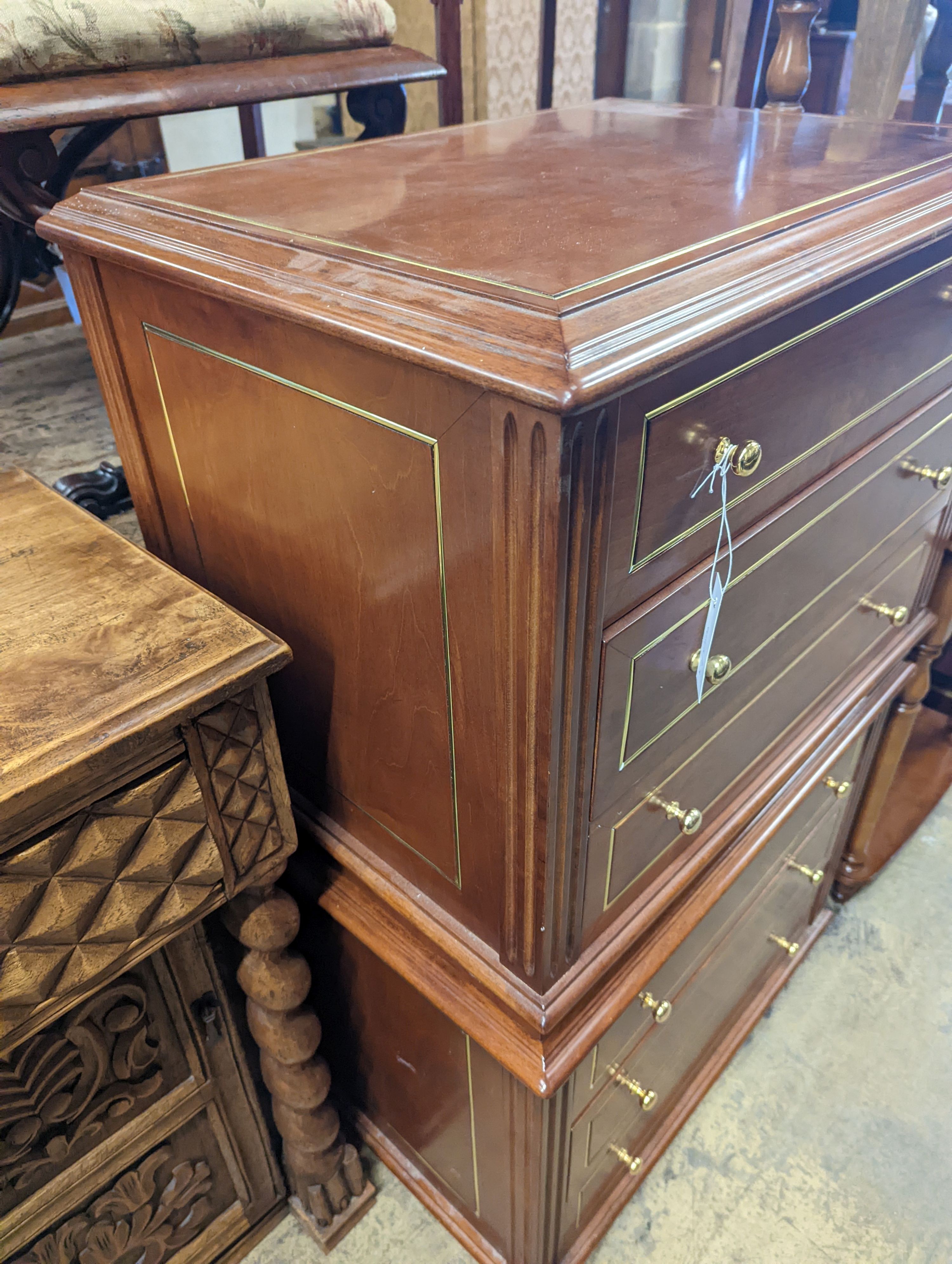 A pair of contemporary brass inlaid cherry bedside chests, width 65cm, depth 45cm, height 50cm